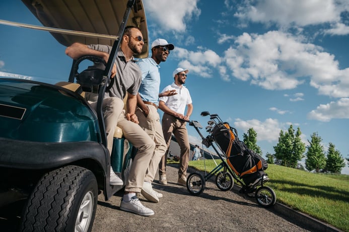 advertise-golf-course-group-of-smiling-friends-standing-near-golf-cart-a-2024-11-17-13-19-40-utc