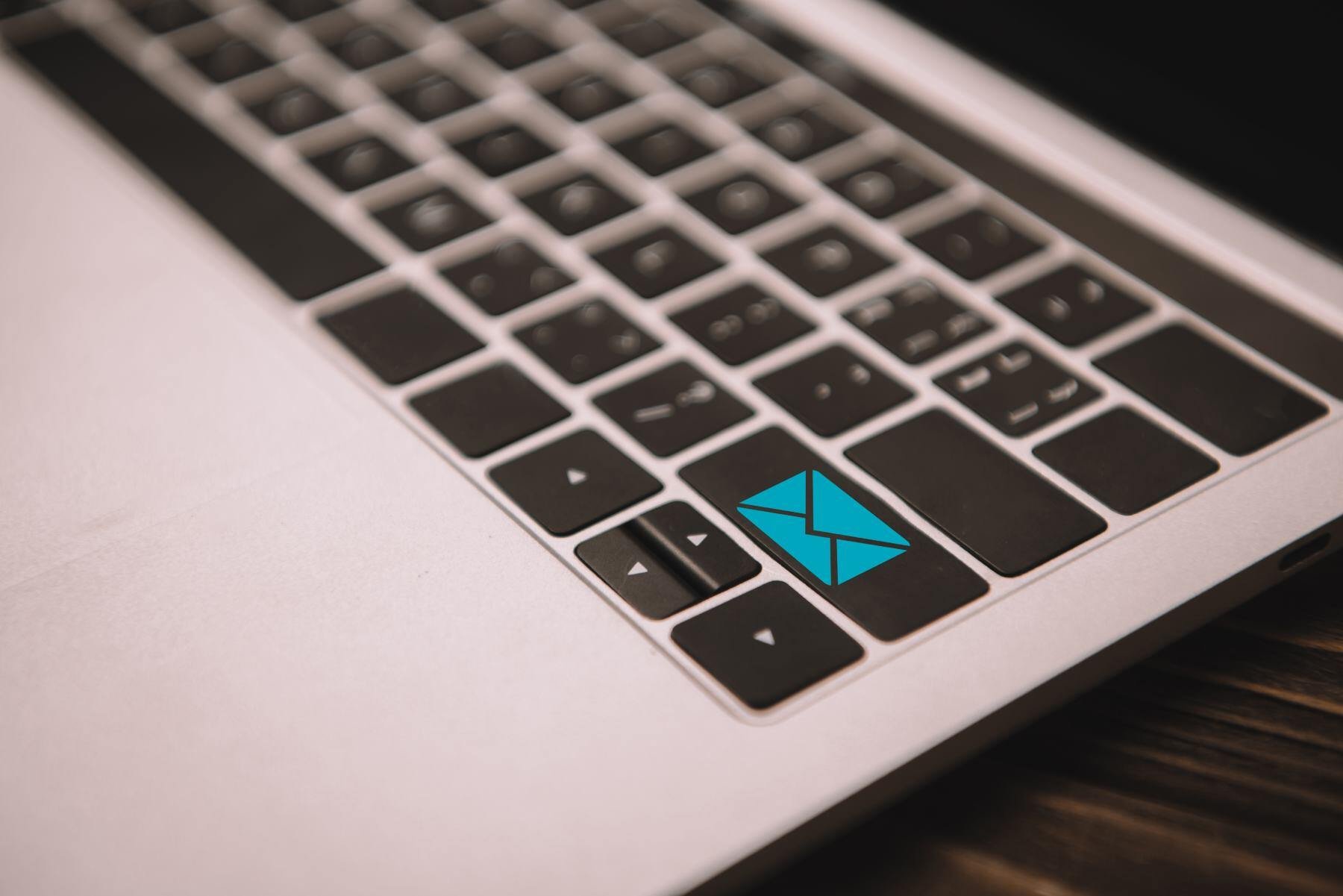 cold-email-strategy-close-up-of-laptop-keyboard-with-email-icon-on-but-2023-11-27-04-59-17-utc