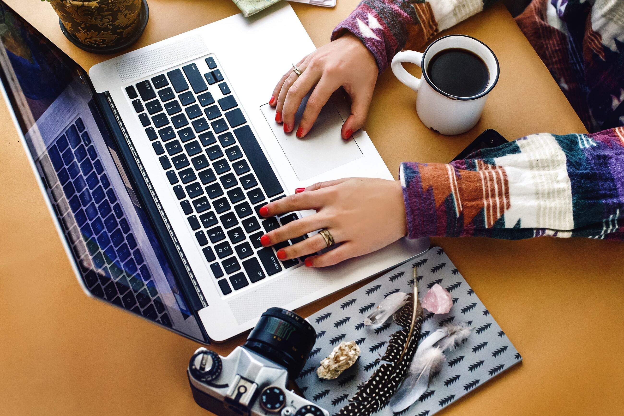 stylish-girl-hipster-hands-planning-summer-travel-2025-03-14-22-57-36-utc-min