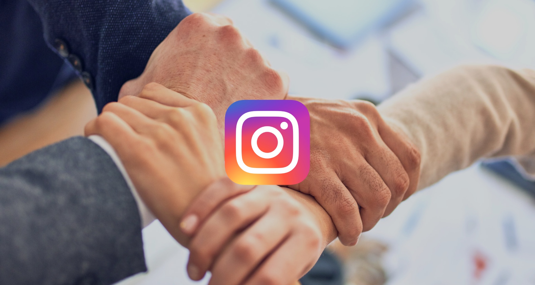 friends shaking hands with Instagram logo